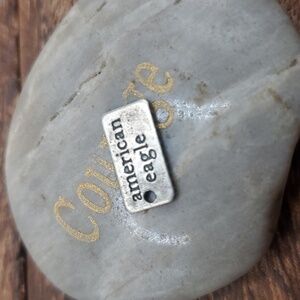 American eagle charm bar tag